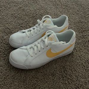 Nike White Canvas Low Tops with Yellow Accent